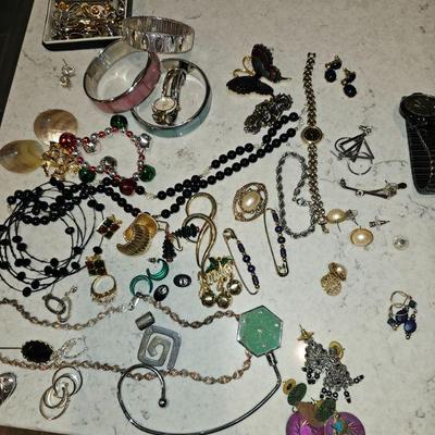 We have 2 lots of jewelry.  Both contain sterling (925)