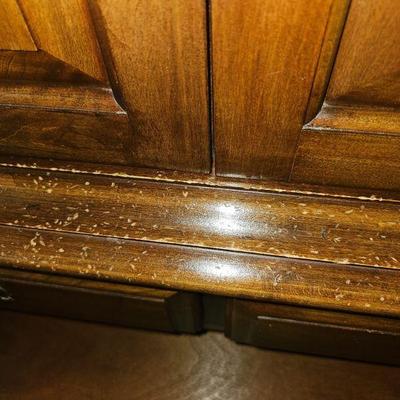 This a nicely constructed armoire, it has slight blemishes on the front of the cabinet