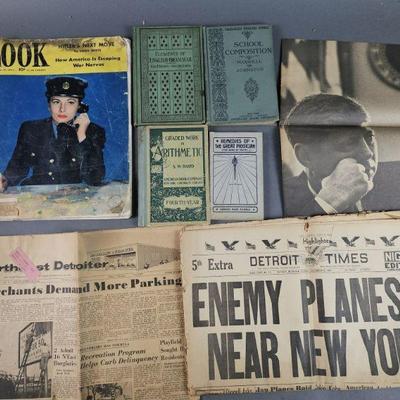 Lot 93 | Vintage Newspapers, School Books, and More