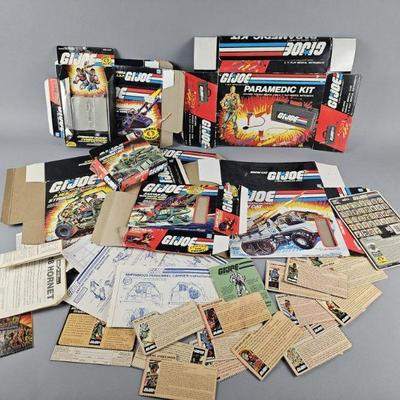 Lot 133 | G.I. Joe Boxes, Manuals & Code Name Cutouts