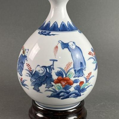Lot 144 | Asian White Porcelain Vase with Underglaze