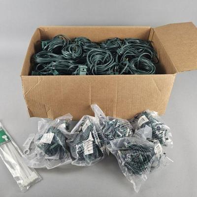 Lot 499 | Lot of Light Extension Cords, New Lights & More!