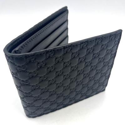 #118 â€¢ Gucci Men's Microguccissima Black Leather Bifold Wallet
