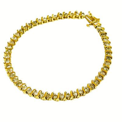 #130 â€¢ 10K Yellow Gold and Diamond Tennis Bracelet
