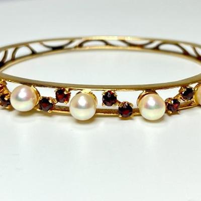 #4 â€¢ 14K Yellow Gold Hinged Bangle Bracelet with Garnets and Pearls
