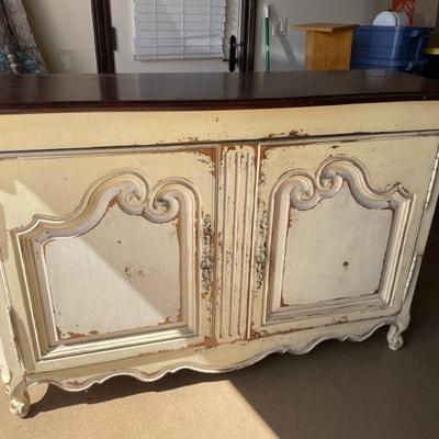 Antiqued White and ivory French Style Two Door Cabinet,  one interior shelf,  dark stained top , just added to the sale!!! 