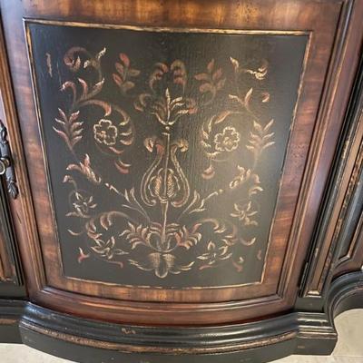 Close up of Hooker Demilune Cabinet 