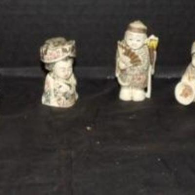 A Group Of 13 Japanese Carved And Polychromed Netsukes