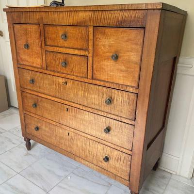 American Tiger maple chest with fantastic drawer configuration.