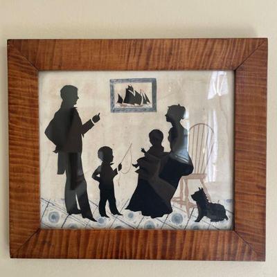 An excellent 19th century silhouette of a family with dog.