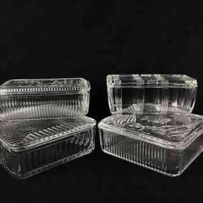 DILA105 Vintage Refrigerator Dishes With Lids	Four clear dishes. Two oblong, measure approximately 4.5