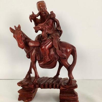 HAYE806 Chinese Redwood Warrior On Horseback Statue	Man on horseback hand carved wood statue in Chinese redwood.
