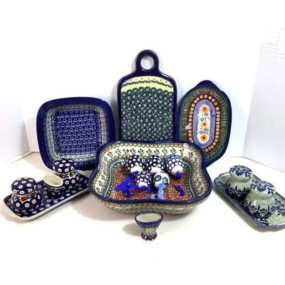 LISU205 Polish Pottery Assortment	All different kinds of dishes and pottery pieces, made in Poland.Â 
