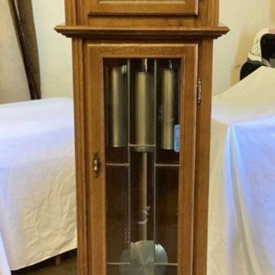 HEBA105 Made In Germany Grandfather Clock	Largest door, made with beveled glass. Side panels are hand poured, & amber tinted.

