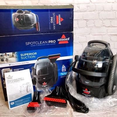 DILA906 Bissel Handheld Upholstery Cleaner	Bissel Spot Clean Pro, model NO. Â 3624. Unused and works. Includes two brush attachments and...