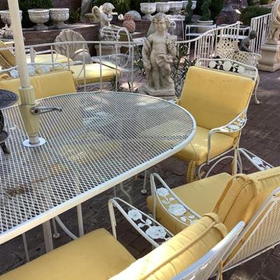 Woodard table and six chairs, heavy and vintage