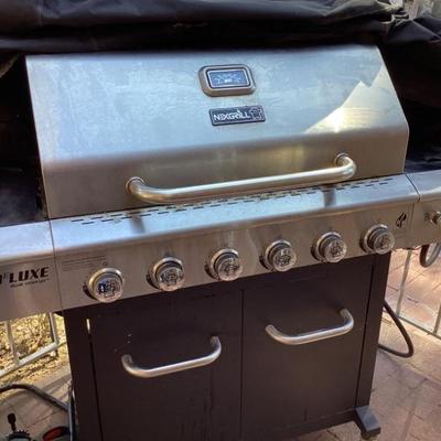 Barbecue with converter, a warmer burner and rotisserie 