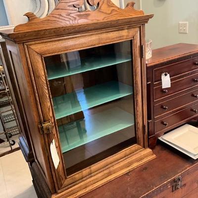 late 1800’s cabinet with original wavy glass