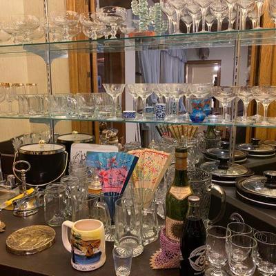 Barware, gold rimmed wine glasses and various beer steins and Weatherly Stemware by Lennox and Princess House etched, white red champagne...