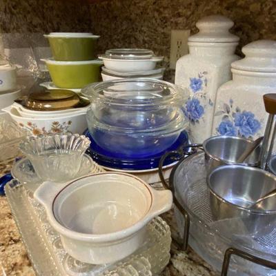 Large assortment of bowls, casserole dishes, serving pieces