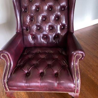 leather padded arm chair 
