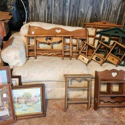 Wood shelves, framed prints