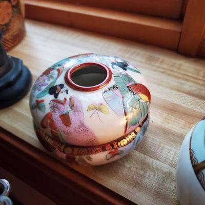 One of 8 asian porcelain pieces