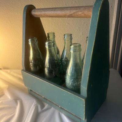  Six vintage  1940-50s  Coca Cola Bottles $20-30. Two Seattle, Two Charlottesville, NC, 1 Winfield, KS. 1 Enid, OK