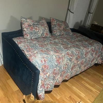Almost totally new navy velvet with silver stud trimming trundle bed $350. 00without mattress 