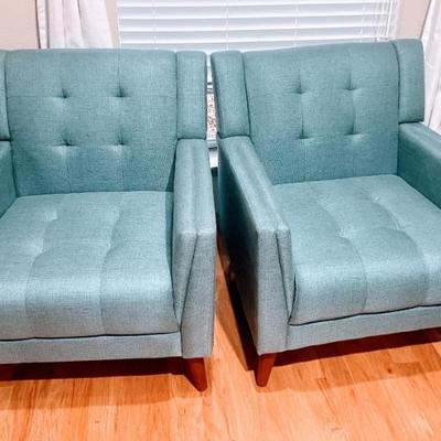 Barely used set of modern sleek style blue arm chairs $135 for both