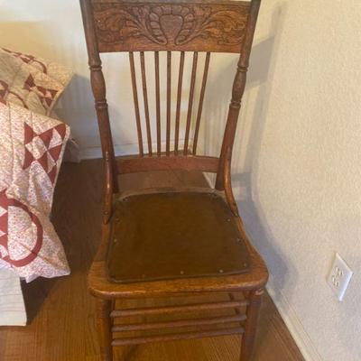 antique chair with leather seat