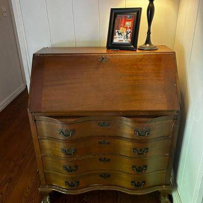 Secretary desk with serpentine drawers