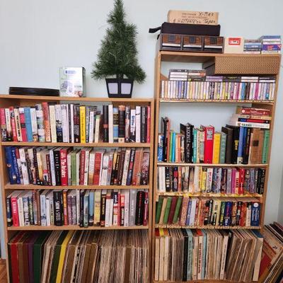 Various records, books, DVD's, and VHS tapes