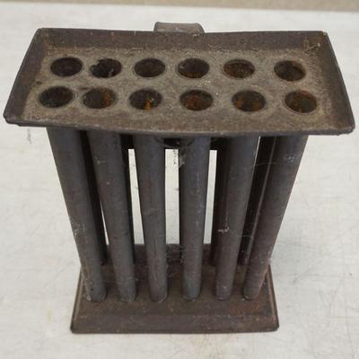 1208	ANTIQUE TIN 12 CANDLE MOLD, APPROXIMATELY 8 IN X 6 IN X 11 IN
