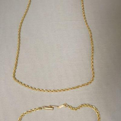 1282	MARKED 14K GOLD TWIST CHAIN, APPROXIMATELY 16 IN L AND BRACELET APPROXIMATELY 7 IN L, 8.5 DWT
