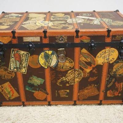 1166	ANTIQUE TRAVEL TRUNK W/TRAVEL STICKERS & 3 INTERIOR TRAYS, BB & B TRUNK CO, APPROXIMATELY 63 IN X 23 IN X 26 IN HIGH
