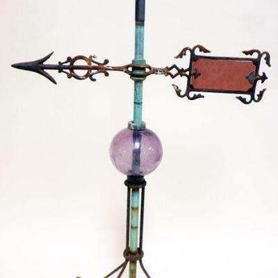 1033	ANTIQUE WEATHER VANE LIGHTING ARRESTER WITH AMYTHEST GLASS BALL AND VANE, APPROXIMATELY 35 IN H
