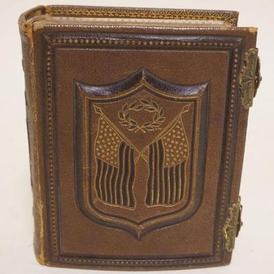 1079	ANTIQUE PHOTO ALBUM WITH PHOTOS, APPROXIMATELY 5 IN X 6 IN X 3 IN, INCLUDES IMAGES OF CIVIL WAR SOLDIER
