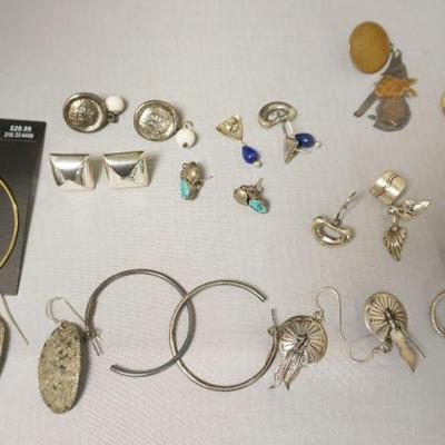 1256	ASSORTMENT OF EARRINGS MOST STERLING SILVER INCLUDING NAVAJO WITH EAR CUFF.
