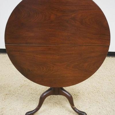 1193	ANTIQUE MAHOGANY TILT TOP TABLE, APPROXIMATELY 86 IN X 29 IN HIGH
