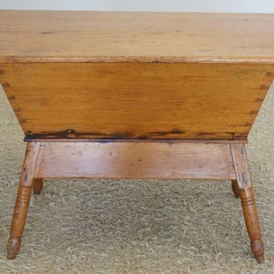 1199	ANTIQUE PINE DOVETAILED DOUGH BOX ON TURNED SPLAY LEGS, APPROXIMATELY 24 IN X 24 IN X 28 IN H
