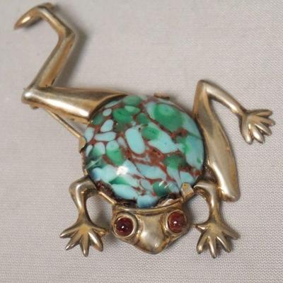 1223	STERLING SILVER FROG PIN WITH STONE STOMACH AND RED STONE EYES
