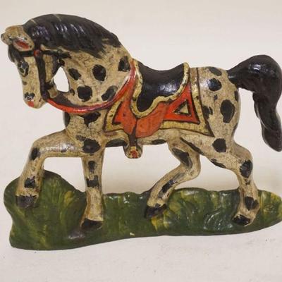 1096	ANTIQUE CAST IRON HORSE, PAINT DECORATED, APPROXIMATELY 6 IN X 5 IN
