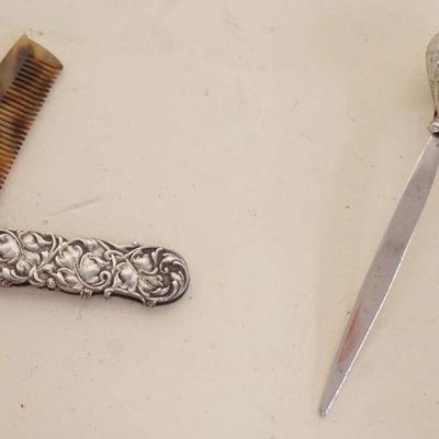 1061	VICTORIAN STERLING SILVER MUSTACHE COMB AND DABBER
