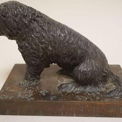 1045	HEAVY BRONZE SCULPTURE OF A SHEEP DOG, APPROXIMATELY 5 1/2 IN X 8 1/2 IN X 7 IN H
