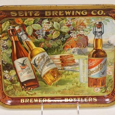 1117	ANTIQUE SEITZ BREWING CO BEER TRAY, EASTON PA BREWERS & BOTTLERS, CHAS W SHONK CO LITHOS, APPROXIMATELY 10 1/2 IN X 13 3/4 IN
