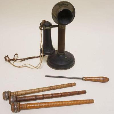 1071	ANTIQUE KELLOG STICK TELEPHONE AND WOOD BOBBINS, PHONE APPROXIMATELY 11 IN H, LOSS TO MOUTH PIECE
