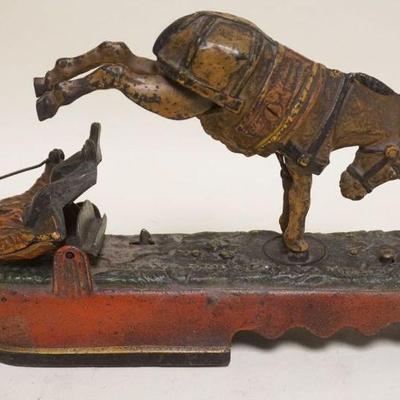 1090	ANTIQUE CAST IRON MECHANICAL BANK, *I ALWAYS DID SPISE A MULE*, PATD APR 27 1897, APPROXIMATELY 3 IN X 10 IN X 6 IN H. MISSING COIN...