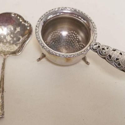 1063	STERLING SILVER FOOTED STRAINER AND STRAINING SPOON, 1.46 TOZ
