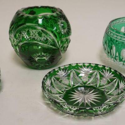 1050	BOHEMIAN GLASS EMERALD GREEN CUT TO CLEAR 4 PC. ASSORTMENT INCLUDING VASES & BOWLS, TALLEST PC. APPROXIMATELY 5 IN H
